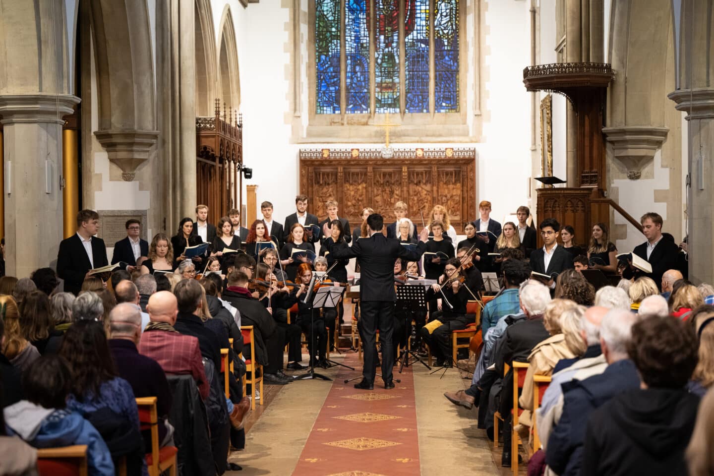 A Choir and Orchestra in a large building